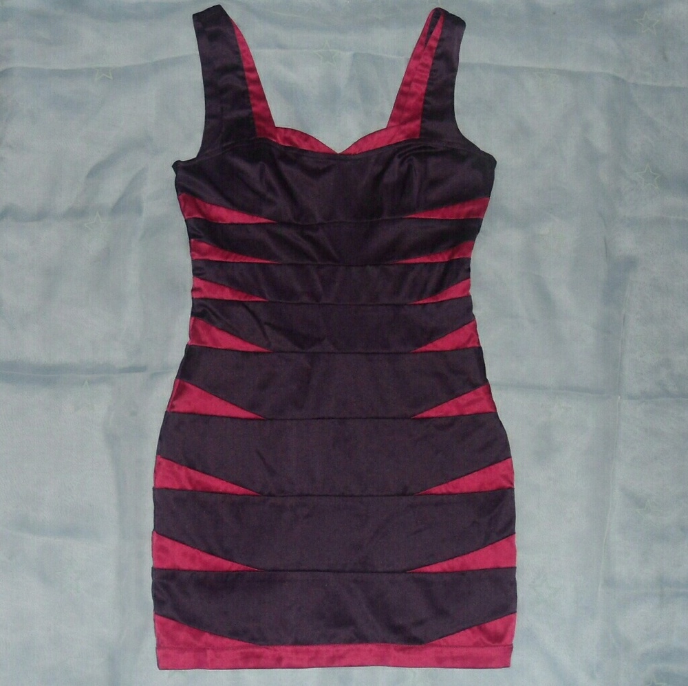 Curve hugging dress, gorgeous!